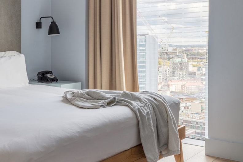 One-bedroom-suite---sky-level-leman-locke-sky-level-studio-or-sky-level-one-bedroom-suite-bed-robe-and-slippers-2018.jpg